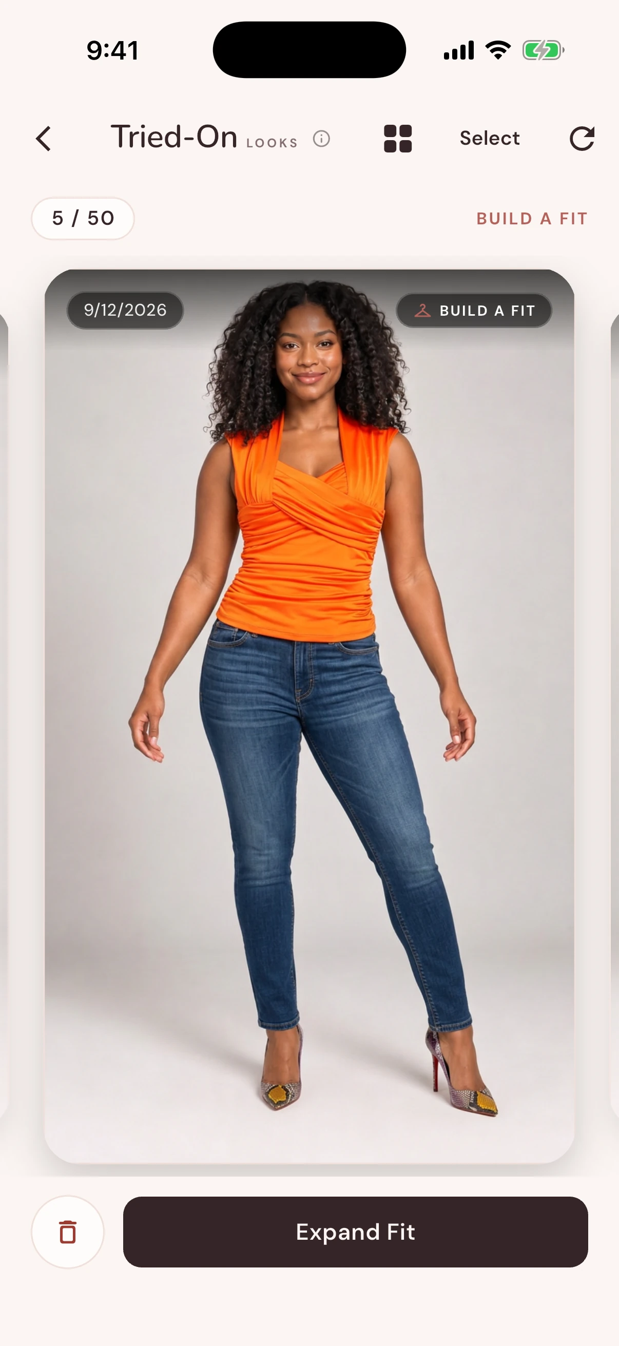 A finished try-on of an orange look